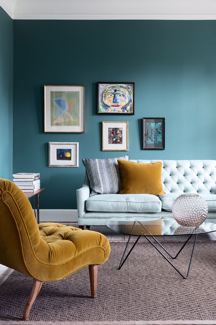 Woman relaxing at home on a sofa